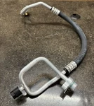 Uac HA10004C Hose Tube Assembly Discharge Line Black Silver Machined Exterior. Fixed Price $20.00.