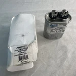 10 Mfd 440 Oval Run Capacitor Mars 12932 Replaces Ge 97F5300BZ3 2MDY8. Fixed Price $15.00.